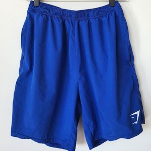 GYMSHARK ATHLETIC SHORTS. BLUE/MEDIUM